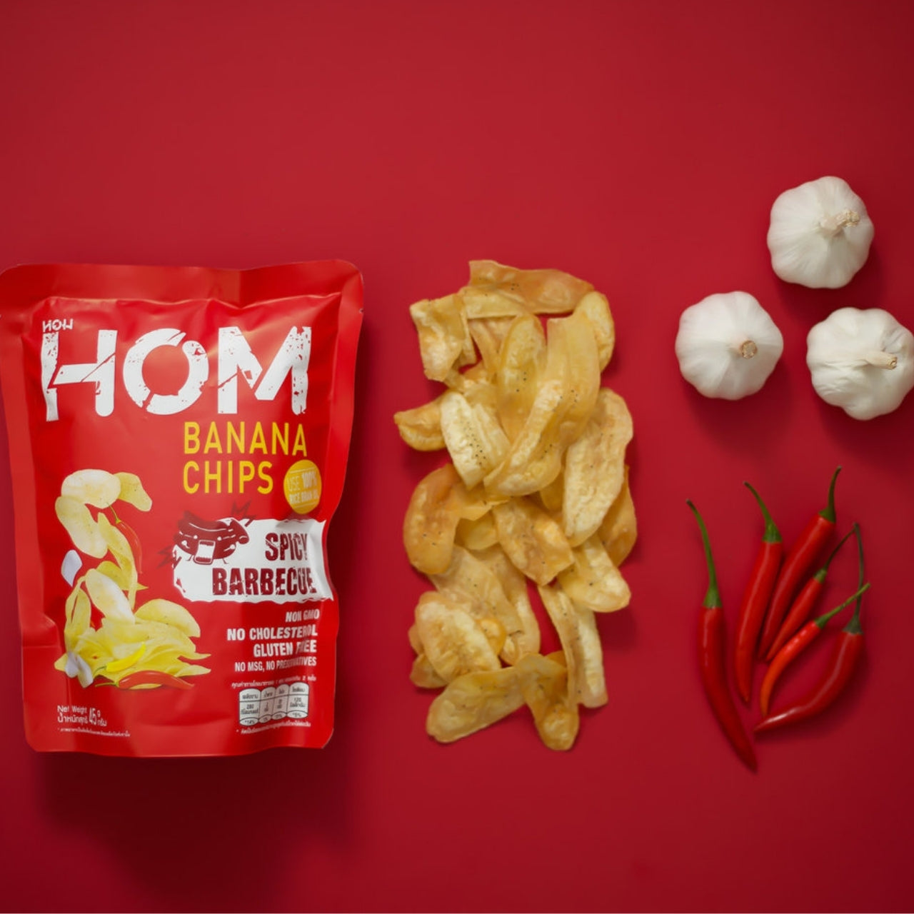 HOM Banana Chips Spicy BBQ Flavor – Crispy handpicked banana chips cooked in rice bran oil, seasoned with smoky and spicy barbecue flavors.