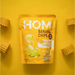 HOM Banana Chips Corn Cheese Flavor – Crispy handpicked banana chips cooked in rice bran oil, seasoned with sweet corn and cheese.