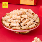 Thai Coconut Rolls Pandan Flavor – Crispy, buttery rolls handcrafted in Kanchanaburi with fresh coconut milk and the aromatic sweetness of pandan leaves for an authentic Thai taste.