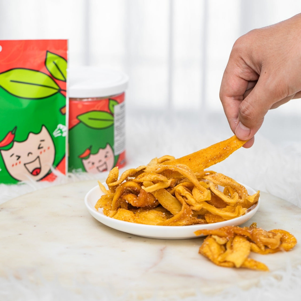Love Farm Spicy Dried Mango – Sweet and chewy dried mango infused with a bold chili kick for a perfect balance of fruity and spicy flavors.