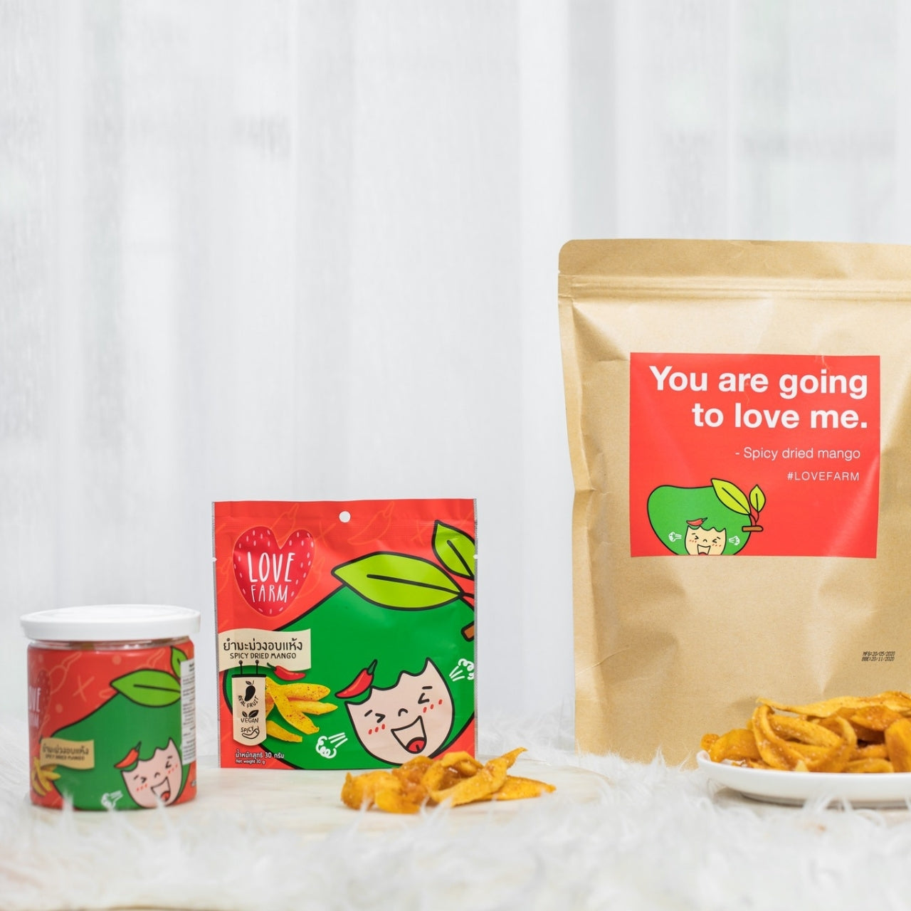 Love Farm Spicy Dried Mango – Sweet and chewy dried mango infused with a bold chili kick for a perfect balance of fruity and spicy flavors.