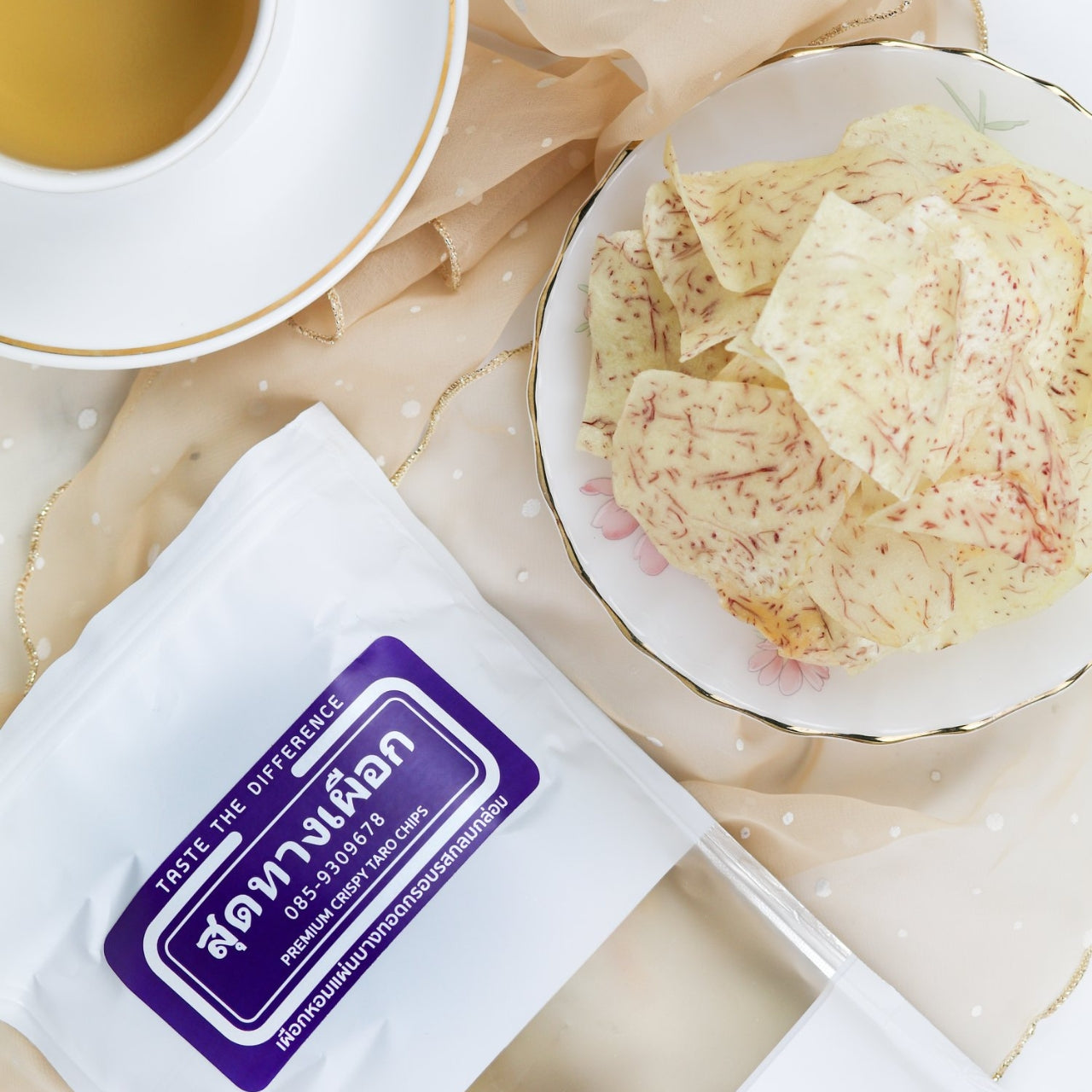 Sud Thang Puek Thin-Sliced Taro Chips – Crispy, aromatic taro chips expertly seasoned and freshly fried for a non-greasy, flavorful crunch.