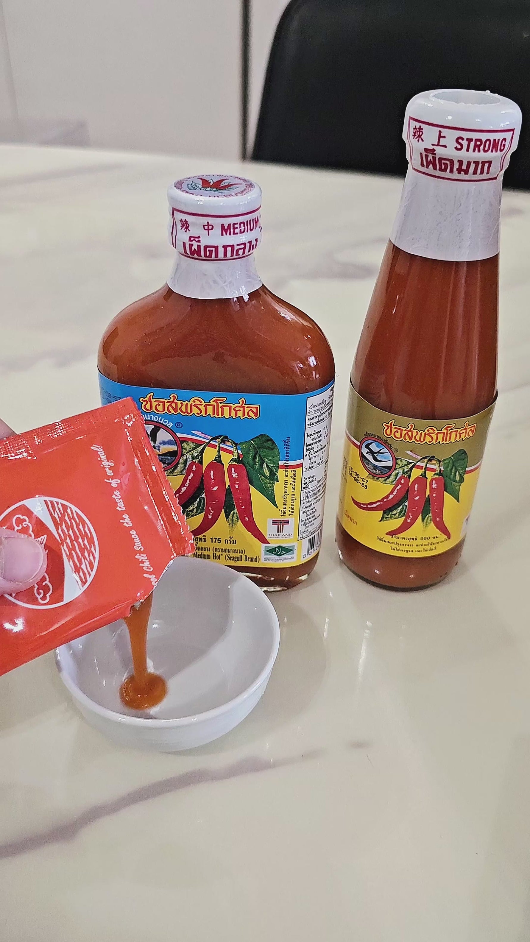 Kosol Chili Sauce (Strong Spice) by Seagull Brand – A bold, intensely spicy Thai chili sauce with a balanced sour-sweet taste and rich chili-garlic aroma, perfect for dipping, marinating, and enhancing flavorful dishes.